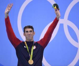Fueron cinco centésimas las que le arrebataron el oro en 2012, cuatro las que le dieron el oro cuatro años después: Michael Phelps recuperó su título en los 200m mariposa y amplió su gloria a 20 oros, foto: AFP.