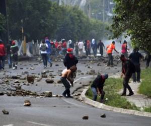 Desde el pasado 26 de noviembre han estallado varias manifestaciones que concluyen en enfrentamientos con la policía y víctimas en ambos frentes. (Foto: AFP/ El Heraldo Honduras/ Noticias Honduras hoy)