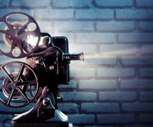 Old film projector with dramatic lighting