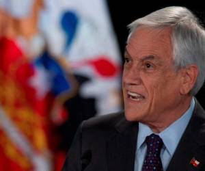 Santiago: el presidente chileno, Sebastián Piñera, se dirige a la nación en Santiago, el 17 de noviembre de 2019. Chile dijo el viernes que celebrará un referéndum para reemplazar la constitución de la era de la dictadura nacional, una demanda clave de los manifestantes después de casi un mes de violentos disturbios civiles. / AFP / CLAUDIO REYES