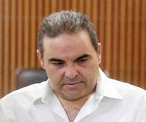 El exmandatario y cinco exfuncionarios de su administración son acusados de peculado, lavado de dinero y agrupaciones ilícitas por el supuesto desvío de 246 millones de dólares durante su gestión presidencial. (Foto: AFP/ El Heraldo Honduras/ Noticias de Honduras)