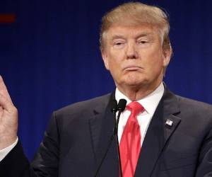 US President Donald Trump, shakes hands during a press conference with Chinas Vice Premier Liu He(L), the countrys top trade negotiator, before they sign a trade agreement between the US and China during a ceremony in the East Room of the White House in Washington, DC on January 15, 2020. (Photo by SAUL LOEB / AFP)