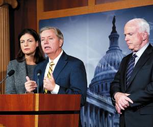 US Senator John McCain(R) (R-AZ), Lindsey Graham(c) (R-SC), and Kelly Ayotte (R-NH) during a press conference November 14, 2012 on Capitol Hill in Washington, DC regarding the terrorist attack in Benghazi, Libya on September 11, 2012. CIA ex-director David Petraeus will testify Thursday before the Senate Intelligence Committee, Senator John McCain said, confirming reports that the fallen general would be on Capitol Hill this week. 'General Petraeus as you know will be testifying before the intelligence committee,' McCain told reporters Wednesday in a Senate studio, adding afterwards that the general's participation would be on Thursday. AFP PHOTO / Karen BLEIER