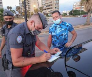 Los comercios y las instituciones públicas y privadas estarán cerrados en esas localidades, salvo las farmacias, panaderías y hospitales. Foto: AP