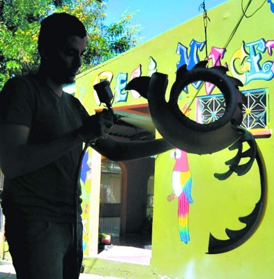 El arte de embellecer reciclando llantas