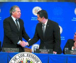 El presidente Juan Orlando Hernández firma con la OEA en Washington la creación de la Maccih y la comunidad internacional aplaude la decisión.
