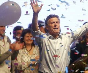 Mauricio Macri celebra triunfo.