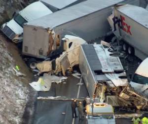 This image from video provided by KDKA TV shows the scene near Greensburg, Pa. along the Pennsylvania Turnpike where multiple people were killed and dozens were injured in a crash early Sunday, Jan. 5, 2020 that involved multiple vehicles, a transportation official said. (KDKA TV via AP)