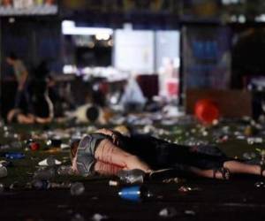 'Estamos calculando más de 50 muertos y 200 heridos a este punto', dijo el lunes temprano el sheriff Joseph Lombardo en un balance temporal de muertos y heridos. Foto AFP
