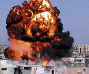 An image grab from video, released by the Syrian opposition Shaam News Network on July 21, 2012, shows an explosion alleged to be in the Jouret al-Shayyah neighbourhood of the central Syrian city of Homs. Feared forces headed by President Bashar al-Assad's brother used helicopter gunships in a new offensive against rebels in Damascus on July 22, as fighting also raged in Syria's second city Aleppo. AFP PHOTO/SHAAM NEWS NETWORK RESTRICTED TO EDITORIAL USE - MANDATORY CREDIT 'AFP PHOTO / HO / SHAAM NEWS NETWORK' - NO MARKETING NO ADVERTISING CAMPAIGNS - DISTRIBUTED AS A SERVICE TO CLIENTS - AFP IS USING PICTURES FROM ALTERNATIVE SOURCES AS IT WAS NOT AUTHORISED TO COVER THIS EVENT, THEREFORE IT IS NOT RESPONSIBLE FOR ANY DIGITAL ALTERATIONS TO THE PICTURE'S EDITORIAL CONTENT, DATE AND LOCATION WHICH CANNOT BE INDEPENDENTLY VERIFIED