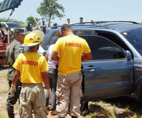 Lanzan carro con cadáver de salvadoreño al río Humuya