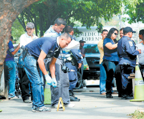 Matan a limpiavidrios y a indigente en San Pedro Sula