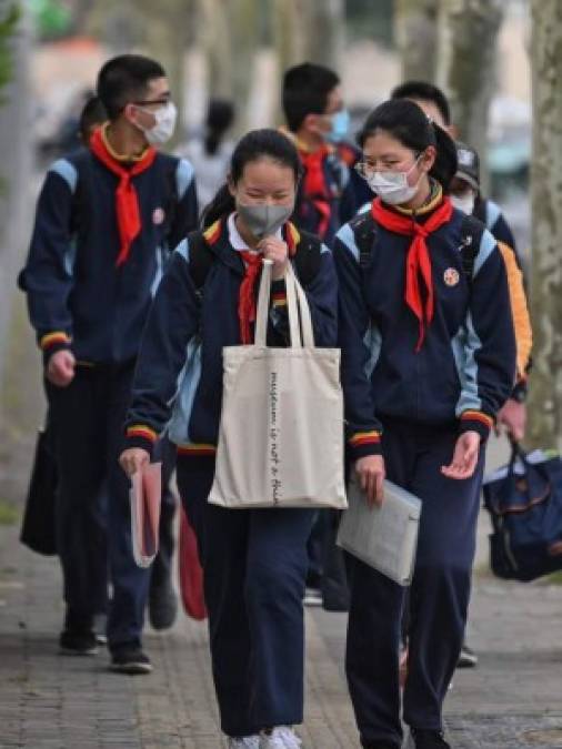 FOTOS: Bajo máxima seguridad, China regresa a clases