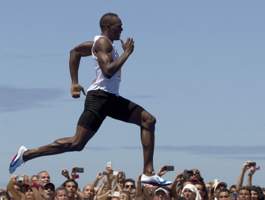 Bolt se impone en los 150 metros en Copacabana
