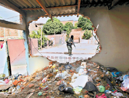 Honduras también tiene sus favelas y están provocando éxodo