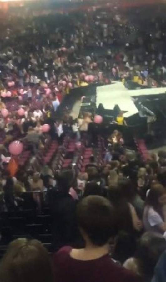 TOPSHOT - This frame grab taken from handout video taken on May 22, 2017 and released to the media via the Twitter account of @HANNAWWH shows the audience near the stage after the end of a concert by US singer Ariana Grande in the northern British city of Manchester where police said a man set off an 'improvised explosive device'.Twenty-two people, including children, were killed and dozens injured when a man detonated a bomb at a pop concert by US star Ariana Grande, in Britain's deadliest terror attack in 12 years. / AFP PHOTO / Twitter account of @HANNAWWH / Handout / -----EDITORS NOTE --- RESTRICTED TO EDITORIAL USE - MANDATORY CREDIT 'AFP PHOTO / Twitter account of @HANNAWWH' - NO MARKETING - NO ADVERTISING CAMPAIGNS - DISTRIBUTED AS A SERVICE TO CLIENTS - NO ARCHIVES