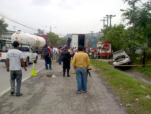 Dentro de taxi matan a dos hombres en norte de Honduras