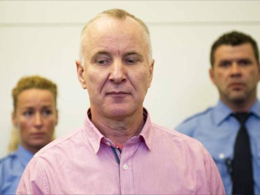 Cadena perpetua a policía descuartizador