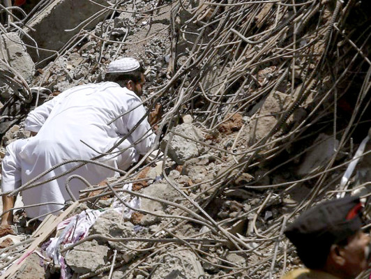 72 muertos en edificio desplomado