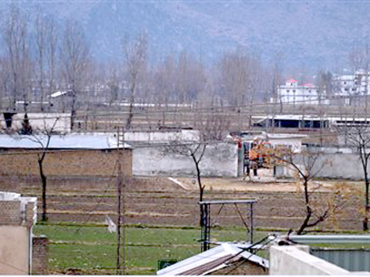 Derribada la residencia de Bin Laden
