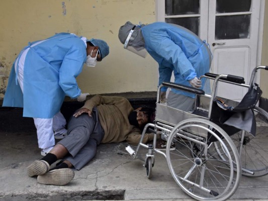 FOTOS: La pandemia deja muertos, penurias y desconfianza en el mundo