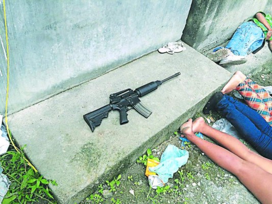 Honduras: A la cárcel e internados supuestos pandilleros hallados con un cadáver