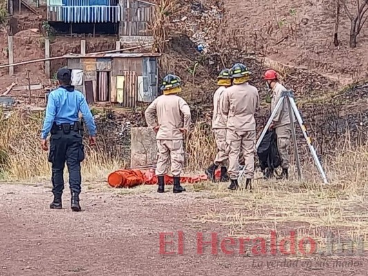 Las dramáticas imágenes del hallazgo del cadáver de un taxista raptado en la capital (FOTOS)