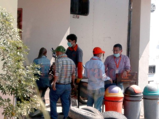 Auditores le caen a taller de mecánica de Hondutel