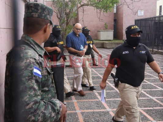 FOTOS: Así fue el traslado de los diez implicados en el desfalco al IHSS hacia los Juzgados Anticorrupción