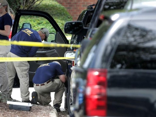 La policía busca los motivos del tirador que mató a 12 personas en EEUU