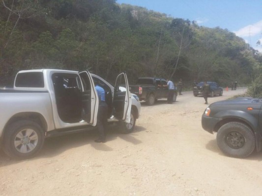 Capturan a un hombre con más de medio millón de lempiras y cuatro armas de fuego