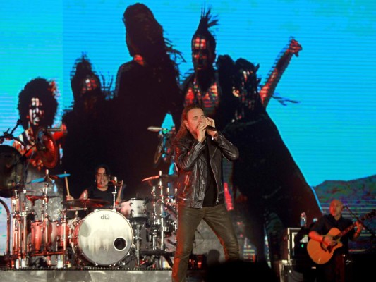 Hondureños cantan al ritmo de Maná