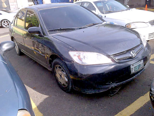 Detienen a policía y mecánico con armas en Tegucigalpa