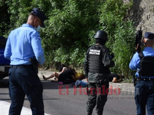 Desgarradora escena de pareja emboscada y acribillada en la capital (FOTOS)