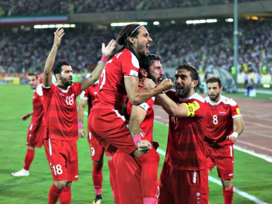 Dividida por la guerra, Siria celebra que sigue aspirando a jugar el Mundial 2018