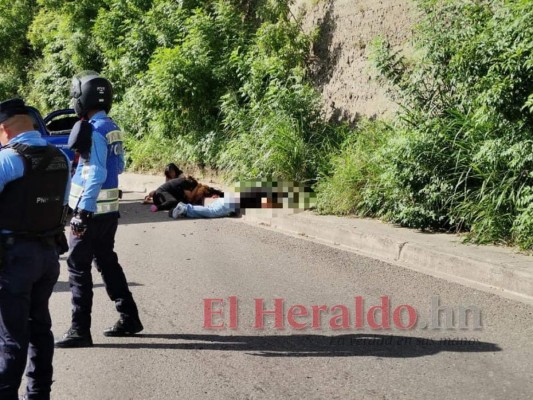Desgarradora escena de pareja emboscada y acribillada en la capital (FOTOS)