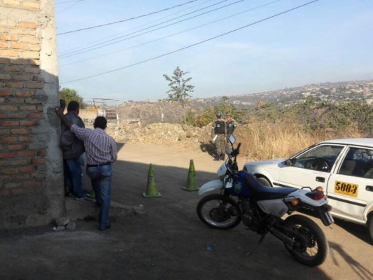 Hallan decapitados a madre e hijo en colonia La Soledad de Comayagüela