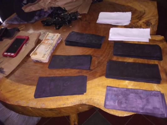 Con más de 300 mil lempiras falsos capturan a dos hombres en el barrio El Centro, Danlí