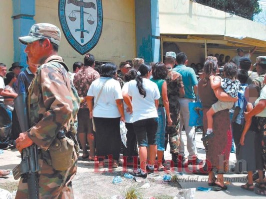 Familiares de las 107 víctimas del Penal de San Pedro Sula deben ser indemnizados. Foto: El Heraldo