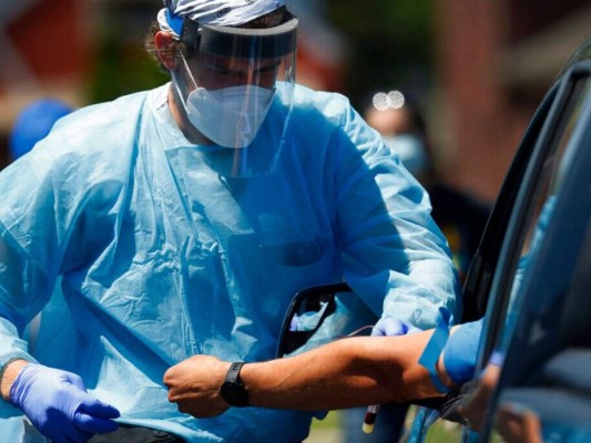 EEUU registra nuevo récord de contagios y la OMS llama a 'luchar'