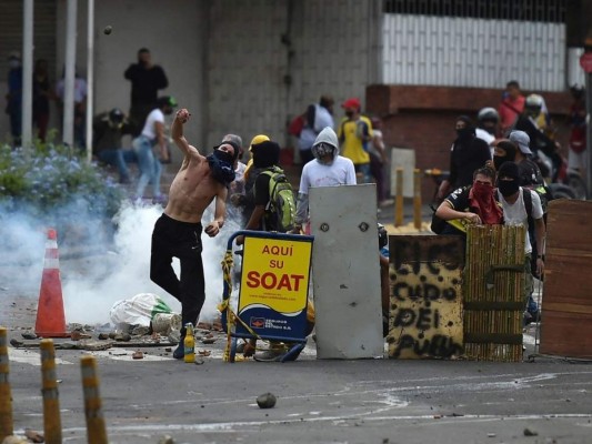 Trece días de protesta dejan 42 muertos en una Colombia en shock por la represión