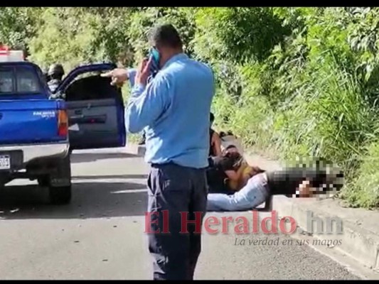 Desgarradora escena de pareja emboscada y acribillada en la capital (FOTOS)