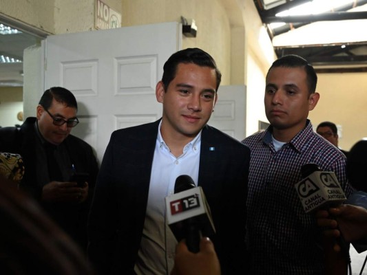 Absuelven a hijo y hermano de presidente de Guatemala
