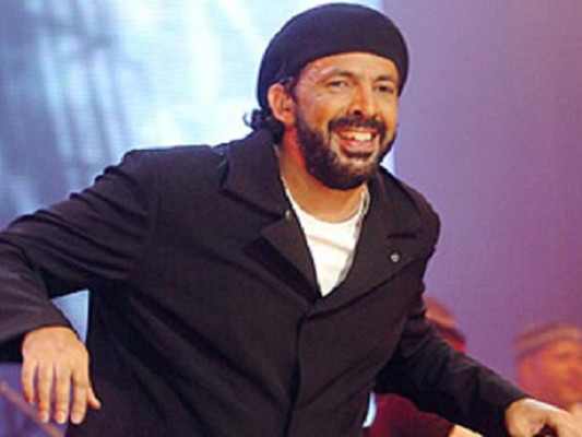 Juan Luis Guerra, aficionado de lujo en el Honduras-Perú
