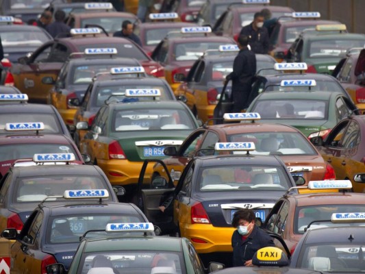 FOTOS: China empieza a retirar restricciones en centro de epidemia 