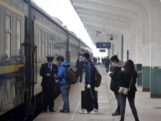 FOTOS: China empieza a retirar restricciones en centro de epidemia 