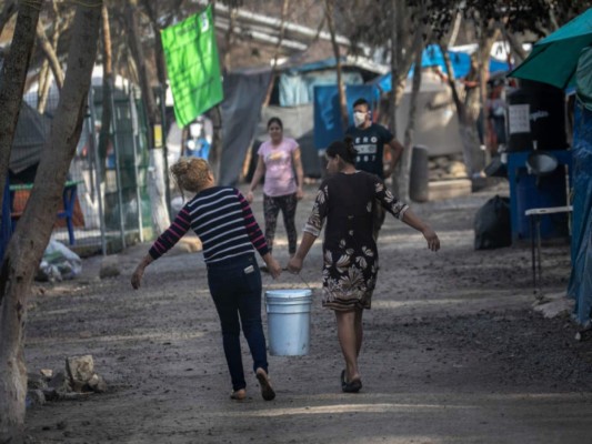 Migrantes expulsados por EEUU saturan campamento en México &nbsp;&nbsp;