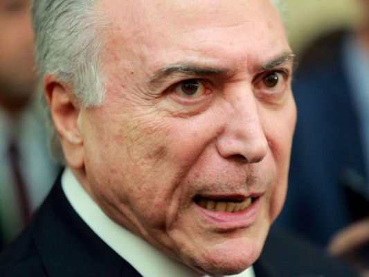 Presidente de Brasil pide una salida democrática en Venezuela