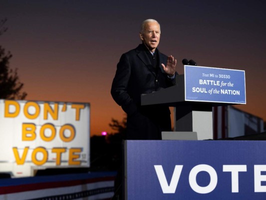 A dos días de elecciones presidenciales, demócratas van puerta a puerta