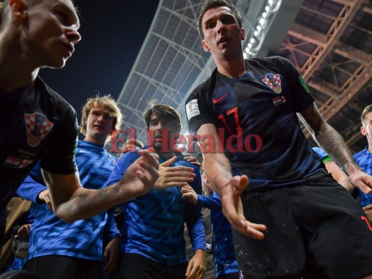 Una foto histórica se dio en el partido de Inglaterra y Croacia donde el fotógrafo Yuri Cortez captó este momento. Foto:AFP